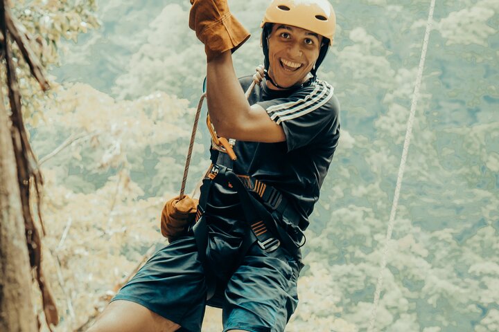 Experience thrilling waterfall rappelling and canyoning adventure in the lush rainforest near Arenal Volcano, Costa Rica, photo 11 | wizardtrip