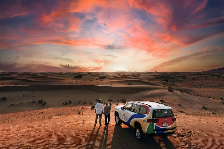 Dubai Evening Desert Safari: Sandboarding, BBQ, Camel Ride & more | wizardtrip