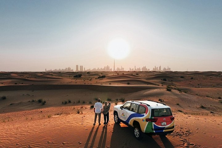 Experience a thrilling Dubai desert safari with dune bashing, camel rides, sandboarding, and a BBQ dinner, photo 6 | wizardtrip
