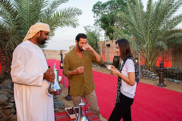 Experience a thrilling Dubai desert safari with dune bashing, camel rides, sandboarding, and a BBQ dinner, photo 7 | wizardtrip