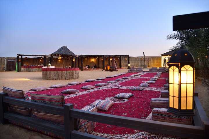 Experience a thrilling Dubai desert safari with dune bashing, camel rides, sandboarding, and a BBQ dinner, photo 9 | wizardtrip