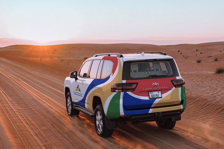 Experience a thrilling Dubai desert safari with dune bashing, camel rides, sandboarding, and a BBQ dinner, photo 17 | wizardtrip