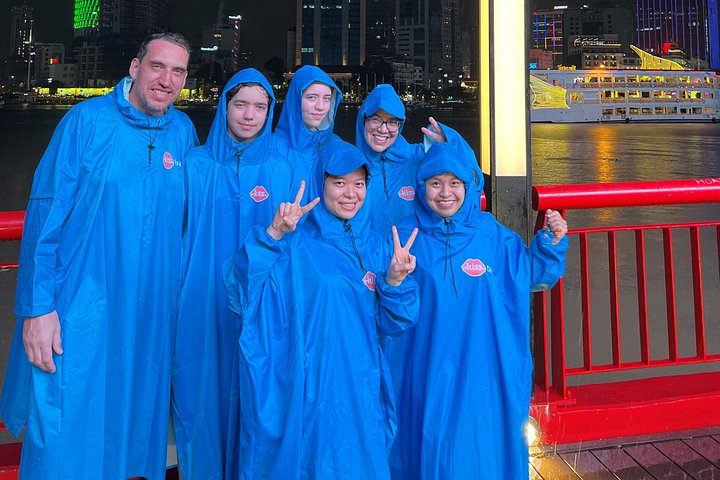 Experience Ho Chi Minh City's vibrant nightlife on a motorbike tour with a female guide, tasting local snacks and seeing city lights, photo 18 | wizardtrip