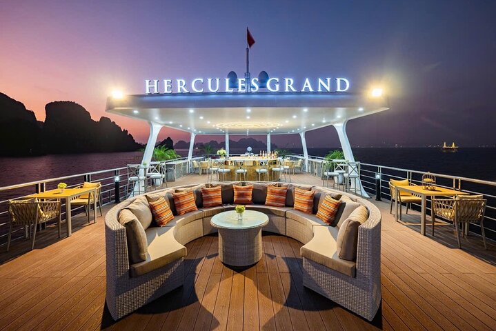 A scenic day cruise through Ha Long Bay, Vietnam, featuring caves, islands, and onboard activities, photo 10 | wizardtrip