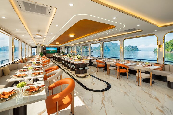A scenic day cruise through Ha Long Bay, Vietnam, featuring caves, islands, and onboard activities, photo 14 | wizardtrip