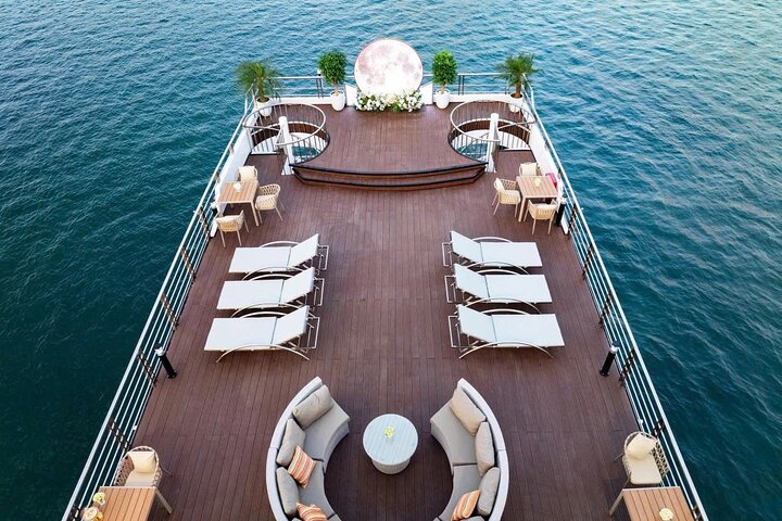 A scenic day cruise through Ha Long Bay, Vietnam, featuring caves, islands, and onboard activities, photo 15 | wizardtrip