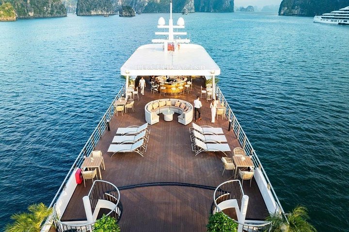 A scenic day cruise through Ha Long Bay, Vietnam, featuring caves, islands, and onboard activities, photo 16 | wizardtrip