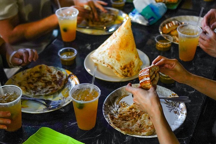 Tour gastronomico e notturno di Singapore con prelibatezze locali e viste sulla città, foto 14 | wizardtrip
