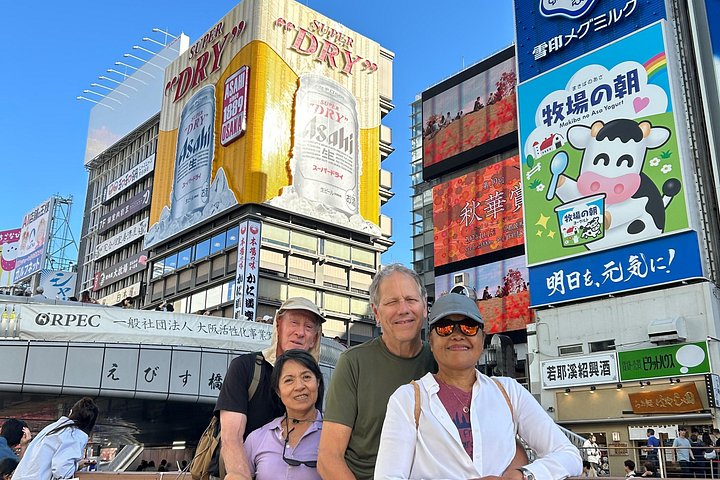 Osaka vandringstur med ikoniska landmärken som Osaka Castle och Dotonbori, lokala marknader och livliga gator, foto 14 | wizardtrip