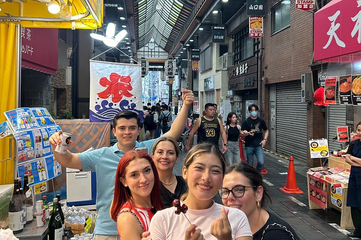 Osaka vandringstur med ikoniska landmärken som Osaka Castle och Dotonbori, lokala marknader och livliga gator, foto 37 | wizardtrip