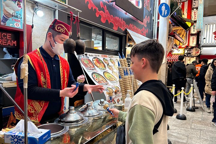 Osaka vandringstur med ikoniska landmärken som Osaka Castle och Dotonbori, lokala marknader och livliga gator, foto 43 | wizardtrip