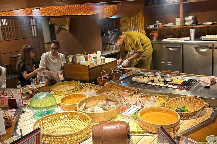 Osaka street food tour with local guide, tasting local dishes and drinks in Shinsekai, photo 19 | wizardtrip