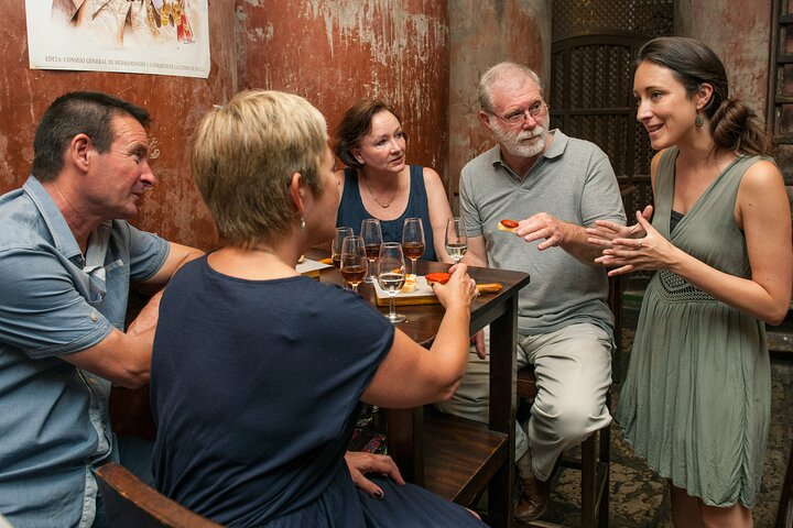 A guided tapas and wine tour through Seville's historic neighborhoods, showcasing local cuisine and culture, photo 7 | wizardtrip