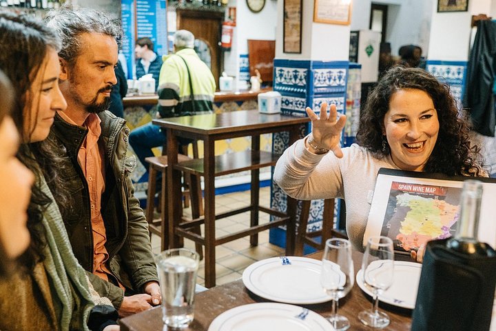 A guided tapas and wine tour through Seville's historic neighborhoods, showcasing local cuisine and culture, photo 11 | wizardtrip