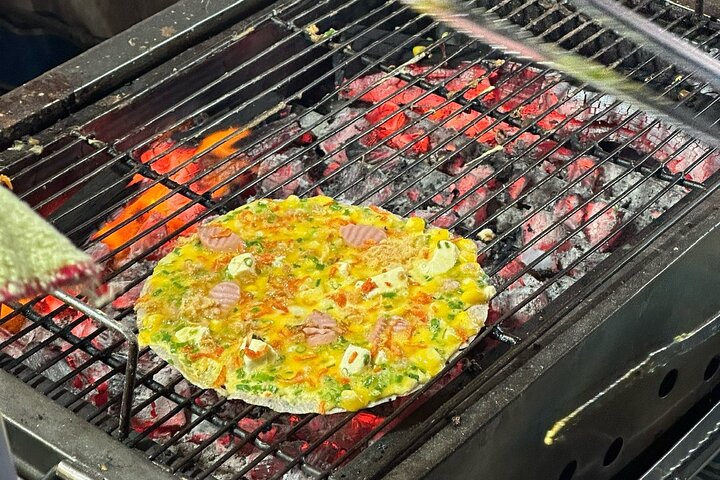 Oplev autentisk Saigon street food og udforsk skjulte gyder på en motorcykeltur, foto 6 | wizardtrip