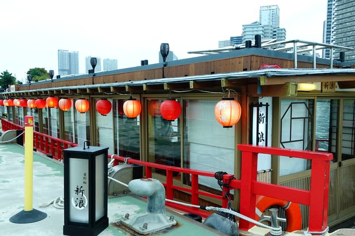 Traditional Japanese Yakatabune houseboat cruise in Tokyo Bay with city skyline views, photo 17 | wizardtrip