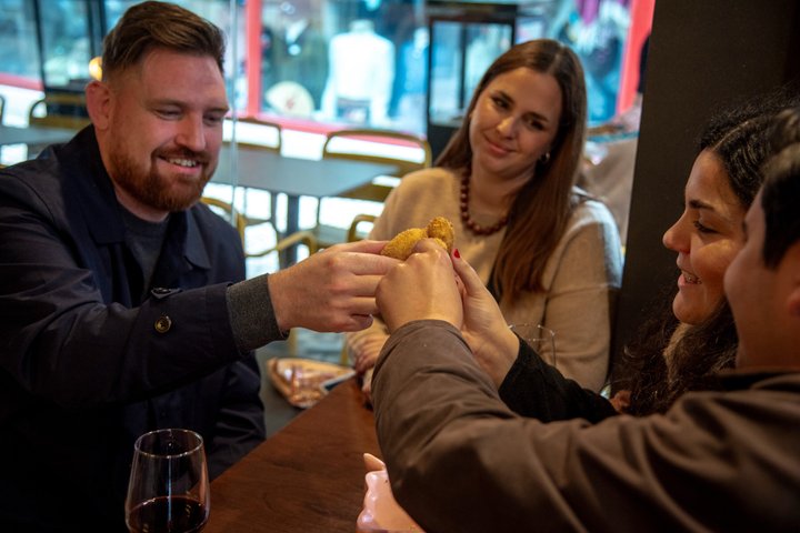 A guided food tour in Seville, Spain, featuring tapas, drinks, and local culture, photo 27 | wizardtrip