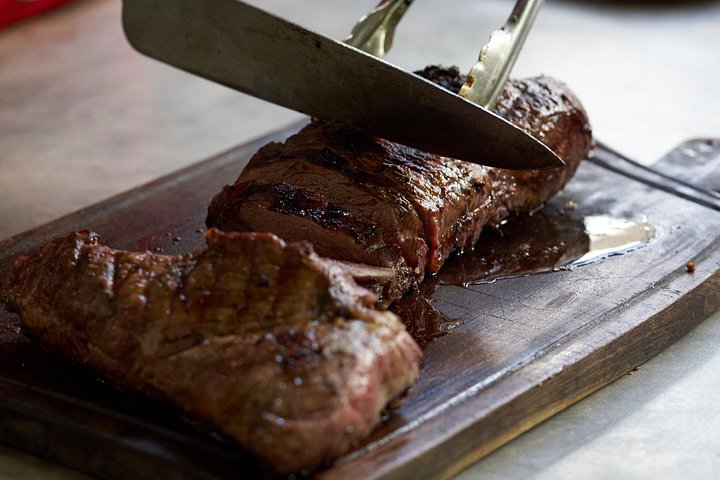 Expérience authentique d'Asado argentin avec une famille locale à Buenos Aires, avec viandes grillées et vin, photo 7 | wizardtrip