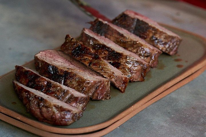 Expérience authentique d'Asado argentin avec une famille locale à Buenos Aires, avec viandes grillées et vin, photo 8 | wizardtrip