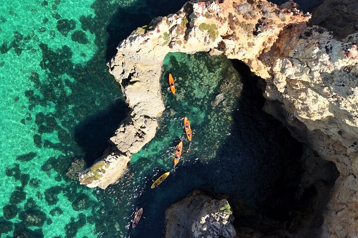 Kayak tour exploring the sea caves and cliffs of Ponta da Piedade near Lagos, Portugal, photo 6 | wizardtrip