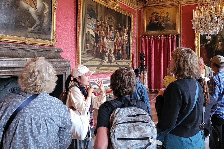 Guided tour of the Palace of Versailles, France, showcasing its opulent interiors and gardens, photo 8 | wizardtrip