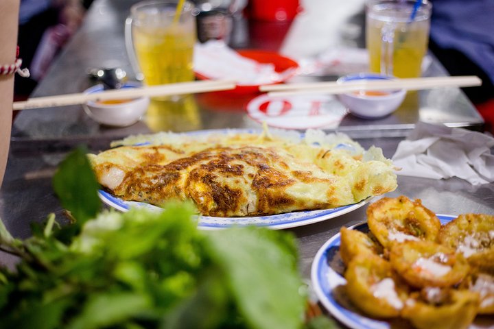 Ho-Chi-Minh-Stadt Street Food Tour mit dem Motorrad bei Nacht, mit lokalen Gerichten und Stadtansichten, Foto 8 | wizardtrip