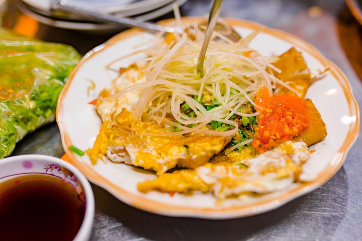 Street food tour in Ho Chi Minh City met lokale gids, met diverse Vietnamese gerechten en levendige avondmarkten, foto 16 | wizardtrip