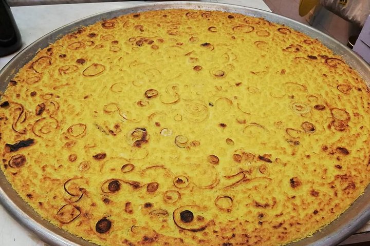 Visite gastronomique de Gênes dégustant des spécialités locales comme le pesto et la focaccia avec un guide, photo 10 | wizardtrip