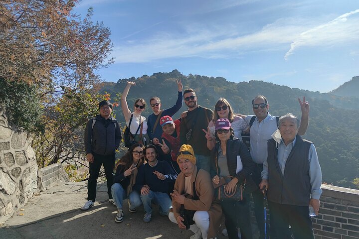 Visite en bus de la Grande Muraille de Mutianyu depuis Pékin, avec des vues panoramiques et une architecture historique, photo 12 | wizardtrip