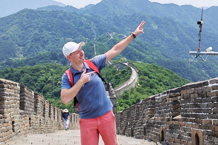 Visite en bus de la Grande Muraille de Mutianyu depuis Pékin, avec des vues panoramiques et une architecture historique, photo 15 | wizardtrip