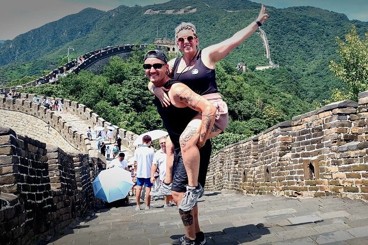 Visite en bus de la Grande Muraille de Mutianyu depuis Pékin, avec des vues panoramiques et une architecture historique, photo 19 | wizardtrip