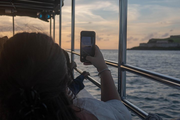 Sunset boat tour in San Juan Bay, Puerto Rico, with views of historic landmarks, photo 7 | wizardtrip
