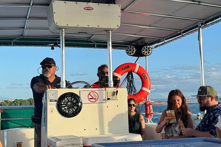 Sunset boat tour in San Juan Bay, Puerto Rico, with views of historic landmarks, photo 11 | wizardtrip