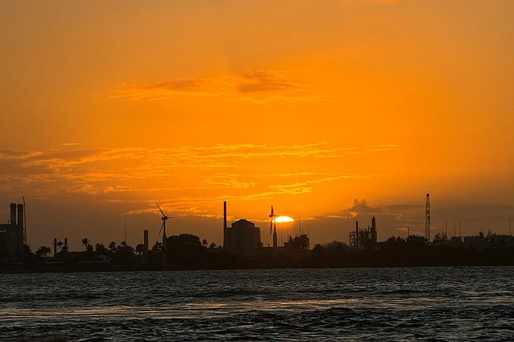 Sunset boat tour in San Juan Bay, Puerto Rico, with views of historic landmarks, photo 12 | wizardtrip