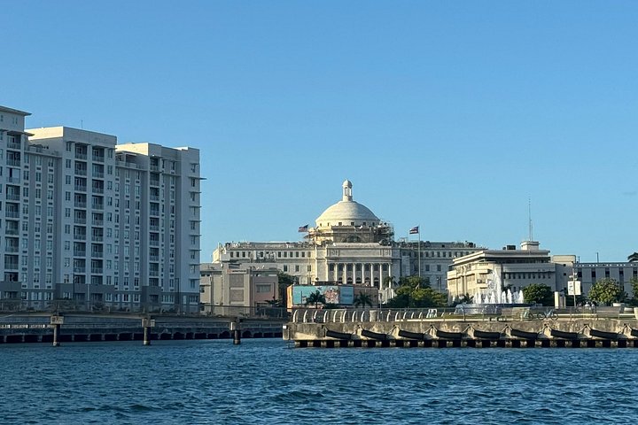 Sunset boat tour in San Juan Bay, Puerto Rico, with views of historic landmarks, photo 14 | wizardtrip