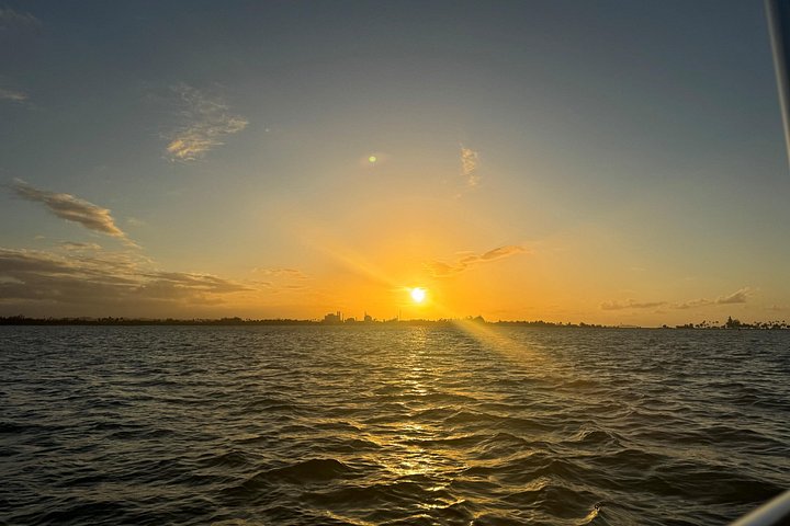 Sunset boat tour in San Juan Bay, Puerto Rico, with views of historic landmarks, photo 17 | wizardtrip