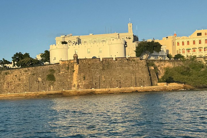 Sunset boat tour in San Juan Bay, Puerto Rico, with views of historic landmarks, photo 20 | wizardtrip
