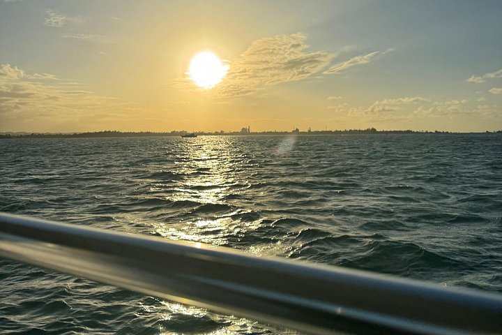 Sunset boat tour in San Juan Bay, Puerto Rico, with views of historic landmarks, photo 21 | wizardtrip