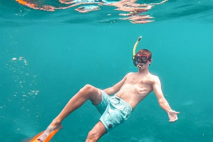 Avventura di snorkeling a Blue Lagoon Beach, Bali, con vibranti barriere coralline e vita marina, foto 8 | wizardtrip