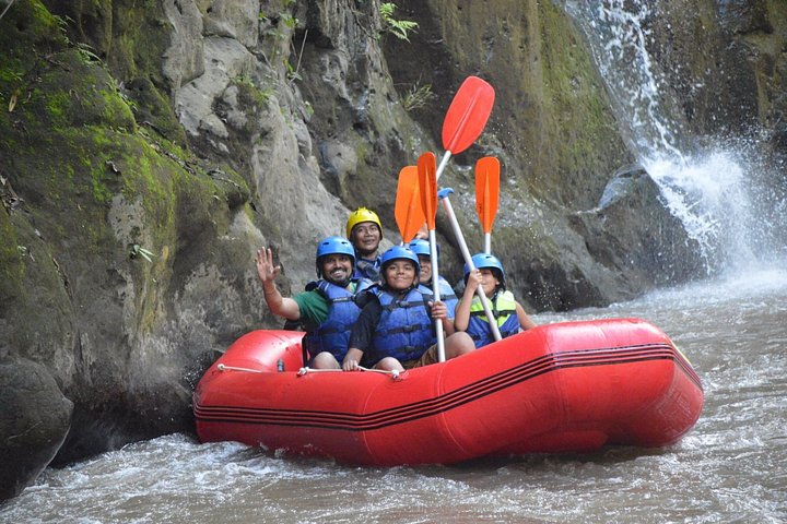 Exciting white water rafting adventure on the Ayung River in Ubud, Bali, surrounded by lush tropical scenery, photo 7 | wizardtrip
