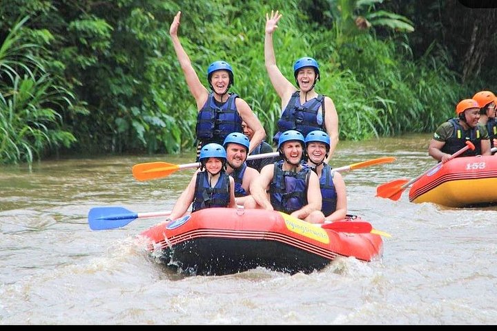 Exciting white water rafting adventure on the Ayung River in Ubud, Bali, surrounded by lush tropical scenery, photo 14 | wizardtrip