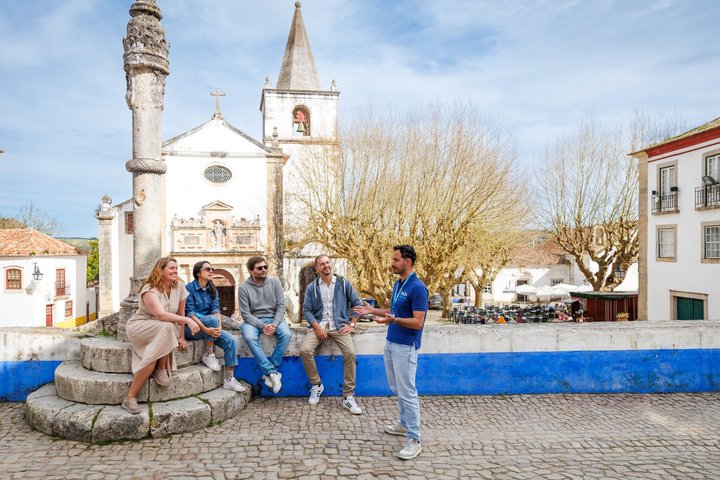 Excursão de um dia em grupo pequeno a partir de Lisboa para Fátima, Nazaré e Óbidos, mostrando locais religiosos, vistas costeiras e vilas medievais, foto 27 | wizardtrip