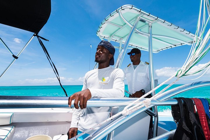 Ervaar spannend parasailen boven de turquoise wateren van Grace Bay, Providenciales, foto 27 | wizardtrip