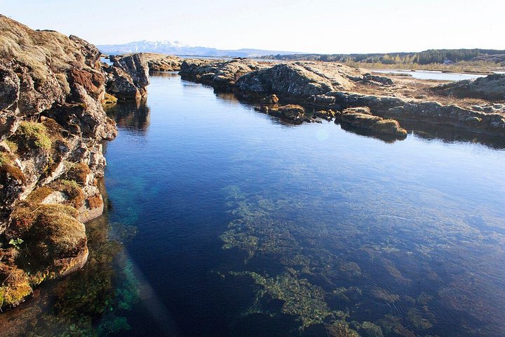 Snorkel mellem tektoniske plader i Islands Silfra-kløft, nyd krystalklart vand og modtag professionelle fotos, foto 10 | wizardtrip