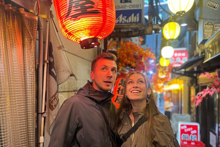 Explore Shinjuku's culinary scene with a local guide, tasting diverse Japanese dishes, photo 1 | wizardtrip