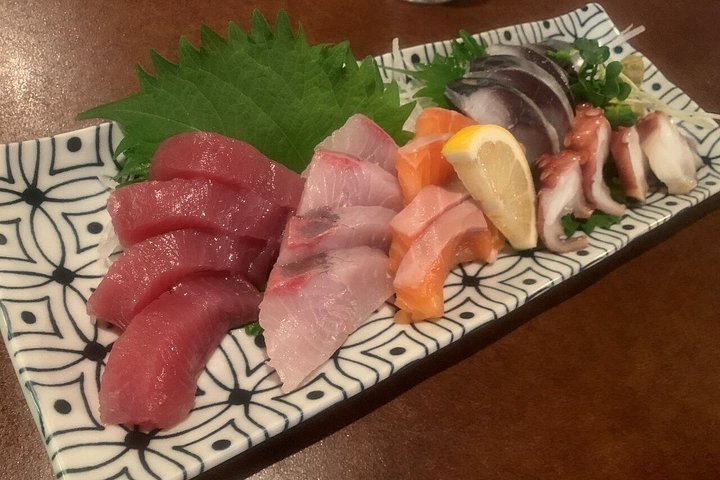 Tour gastronómico guiado por Osaka con diversos platos japoneses e izakayas locales, foto 17 | wizardtrip