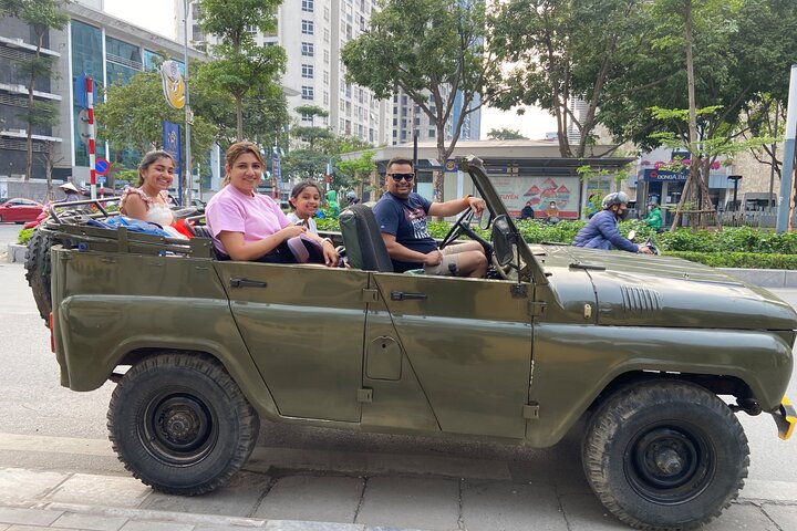 Vintage Jeep tour exploring Hanoi's highlights, including Train Street, local life, and scenic lakes, photo 7 | wizardtrip