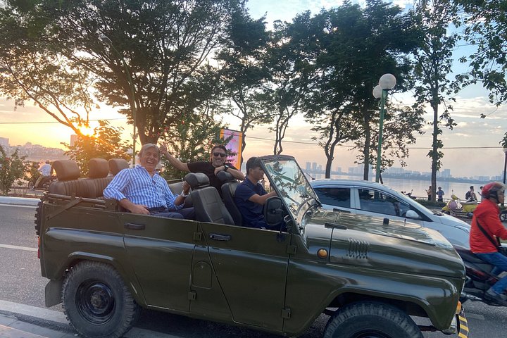 Vintage Jeep tour exploring Hanoi's highlights, including Train Street, local life, and scenic lakes, photo 11 | wizardtrip