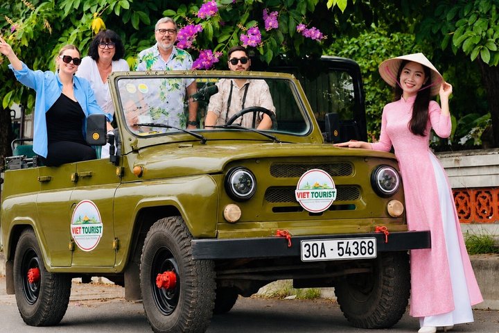 Vintage Jeep tour exploring Hanoi's highlights, including Train Street, local life, and scenic lakes, photo 15 | wizardtrip