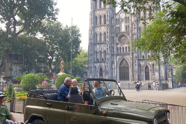 Vintage Jeep tour exploring Hanoi's highlights, including Train Street, local life, and scenic lakes, photo 17 | wizardtrip